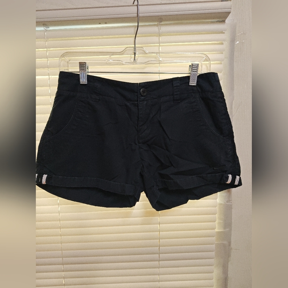Nike Black Women's Shorts with White Stripe Detail